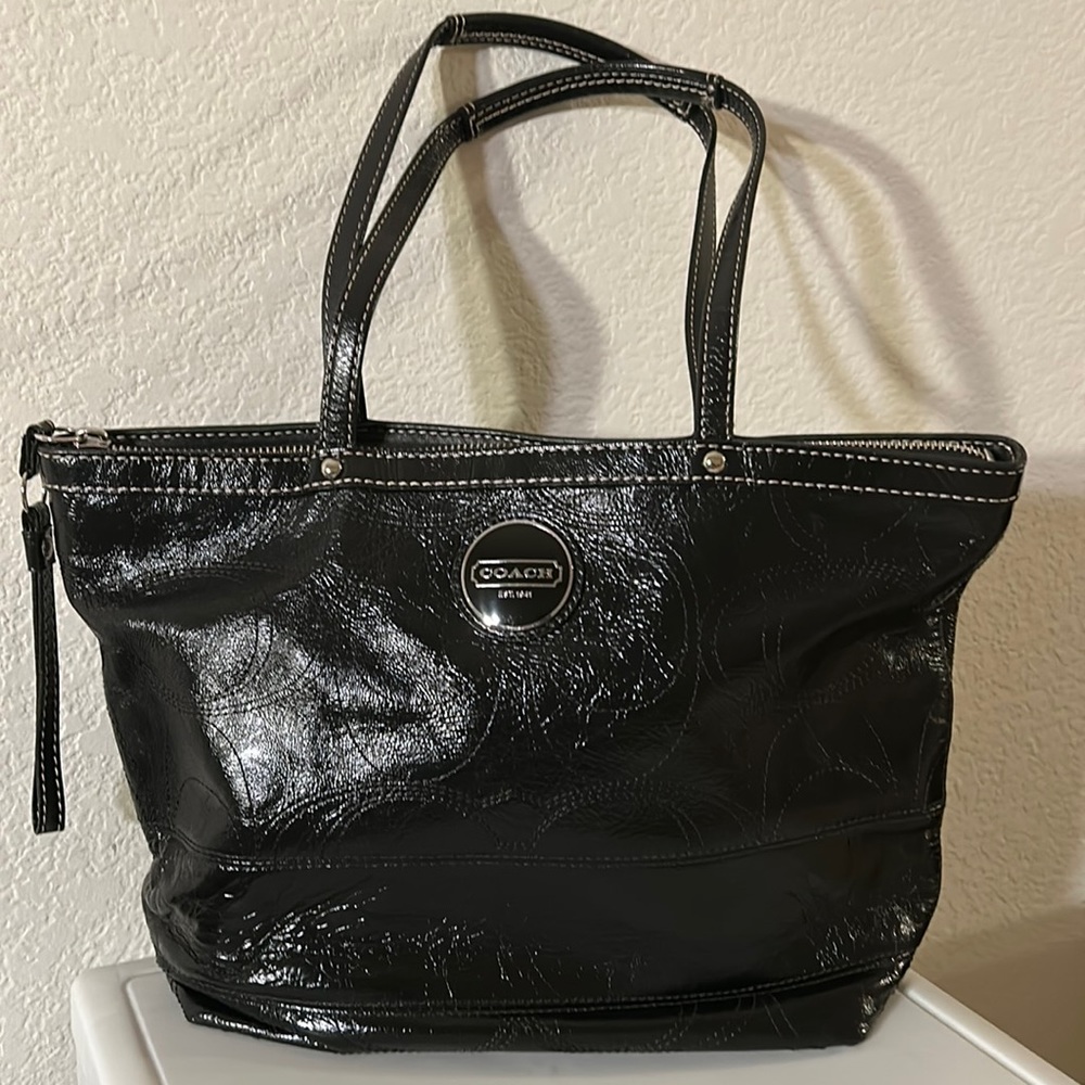 Coach hand crafted from full grain cowhide leather